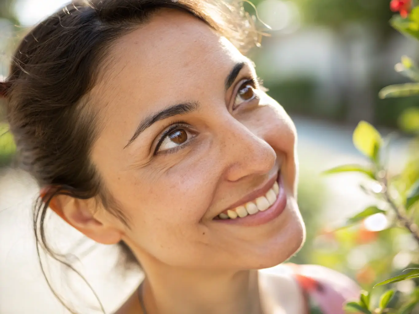 A photograph of Ansa Khan interacting with a family during a portrait session, highlighting her friendly and approachable demeanor.